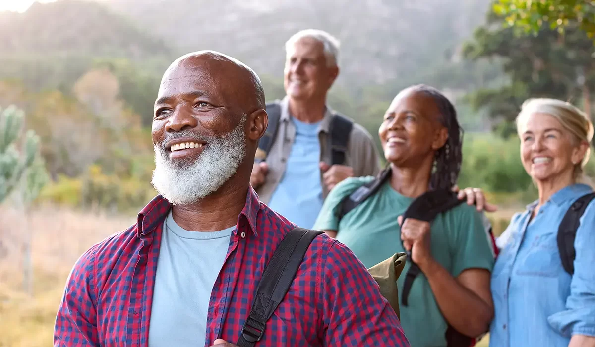 Friend group in their 60's hiking